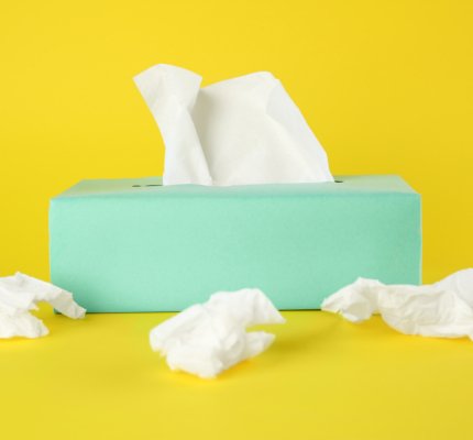 Used,Paper,Tissues,And,Box,On,Yellow,Background